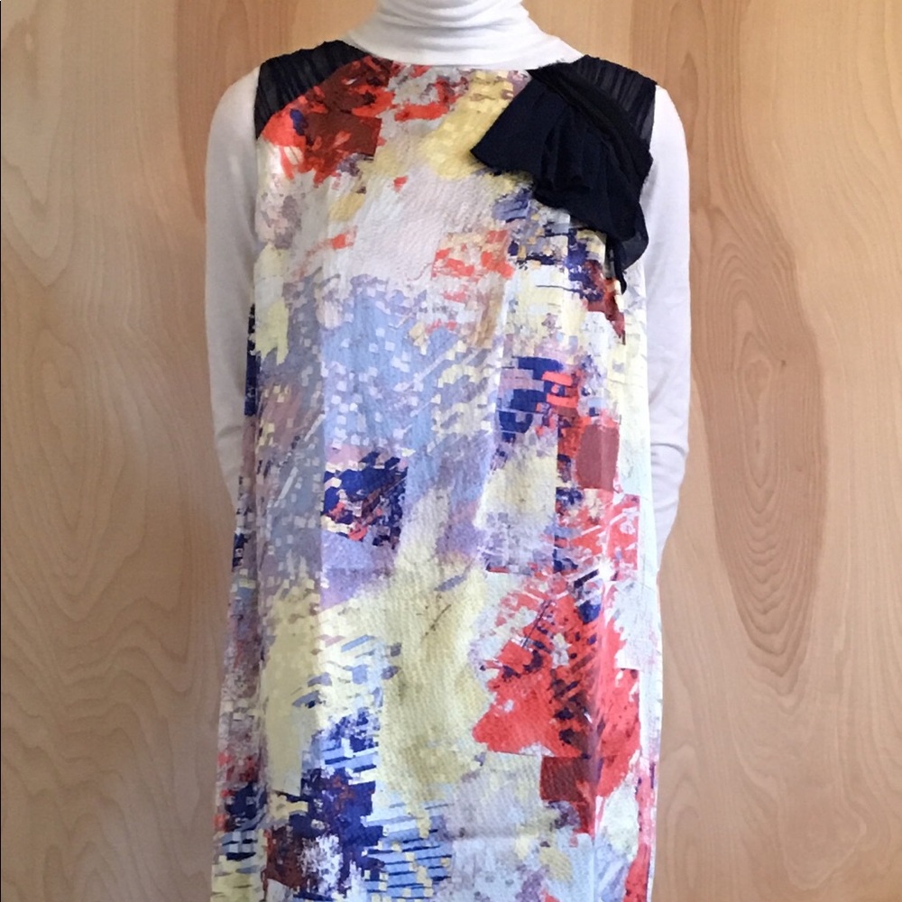 ABSTRACT PATTERN WITH CONTRAST PLEATED DETAIL